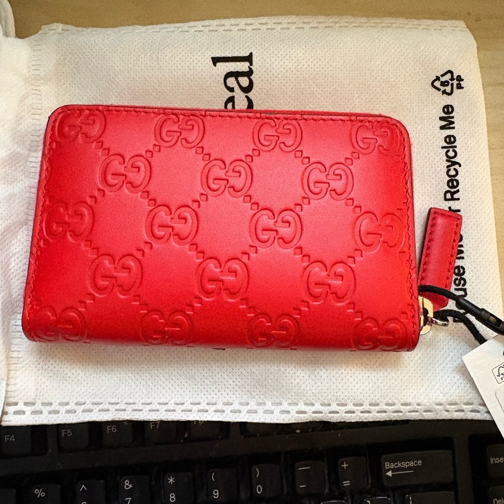 Gucci Guccissima Small zip wallet